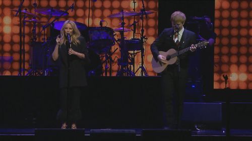 Kylie Minogue and Ed Sheeran on stage at Michael Gudinski memorial at Rod Laver Arena