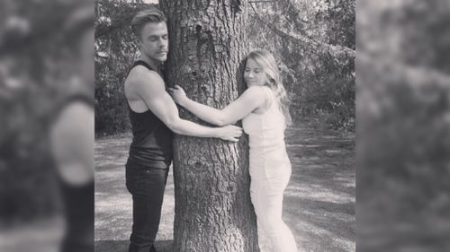 Derek Hough also shared an image of he and Bindi as 'tree-huggers'. (Instagram / @derekhough)