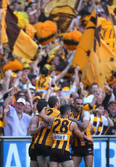 <b>Hawthorn have smashed Sydney in the AFL grand final to confirm their status as one of the modern era's greatest teams.</b><br/><br/>The Hawks unleashed their most unsociable football on Saturday at the MCG and the Swans had no answer to Hawthorn's relentless pressure.<br/><br/>It is Hawthorn's 12th premiership and their first back-to-back flags in 25 years, while captain Luke Hodge became the third player in history to win a second Norm Smith Medal in his 250th match.<br/><br/>