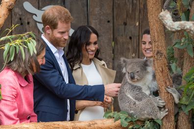 Harry and Meghan meet a Koala called Ruby during a visit to Taronga Zoo in Sydney on the first day of the Royal couple's visit to Australia.