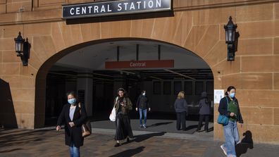 Commuters leaving Central station wearing masks in Sydney 