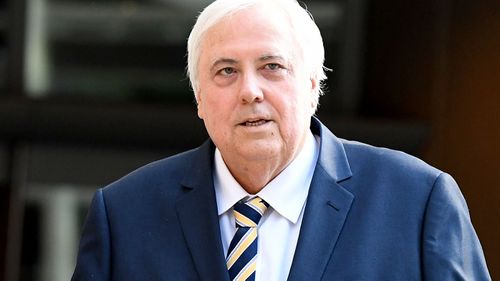 Clive Palmer riled by questions over woman he paid $250k to fly in private jet