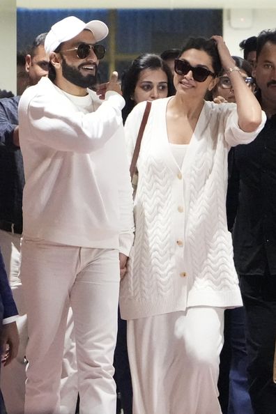 Bollywood actors Ranveer Singh, left and Deepika Padukone arrive at airport to attend the pre-wedding celebrations of Anant Ambani and Radhika Merchant in Jamnagar, India, Thursday, Feb. 29, 2024. (AP Photo/Ajit Solanki)