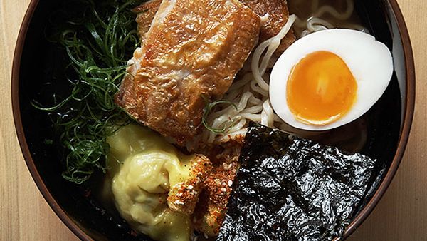 Supernormal ramen with chicken in broth with soy eggs