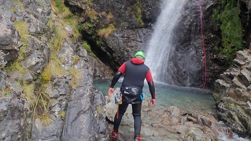 Police search teams scour the Rolleston River area on the West Coast, where human remains believed to be missing tramper Marni Sheppeard were recovered on Saturday