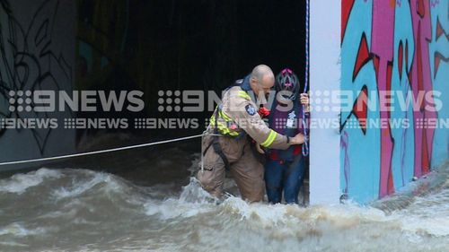 “Fire crews with personal floatation devices approached the family, ” Greg Bardock from the MFB told 9News. 