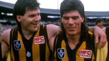 Jason Dunstall and Gary Ayres of the Hawks celebrate after winning the 1989 AFL grand final against the Cats.