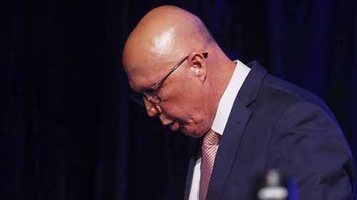 Australian Liberal Party leader Peter Dutton walks from the stage after making a concession speech