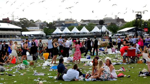 Racegoers relax at the track. (AAP)