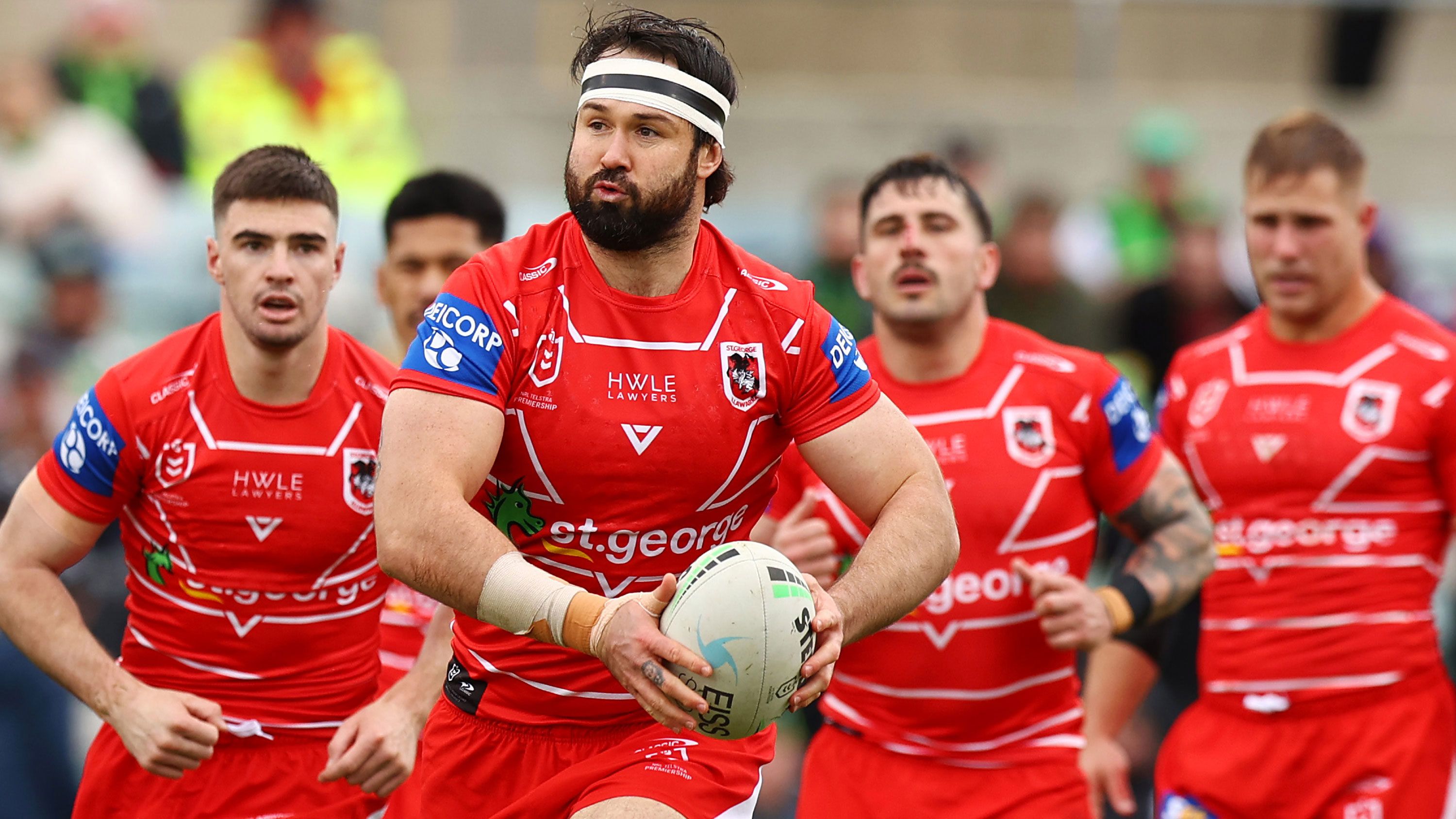 Aaron Woods runs the ball for the St George Illawarra Dragons.