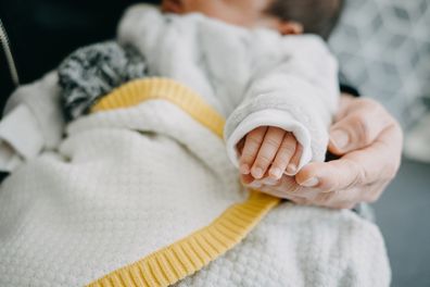 Grandmother holding baby