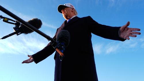 US President Donald Trump speaking to reporters. 