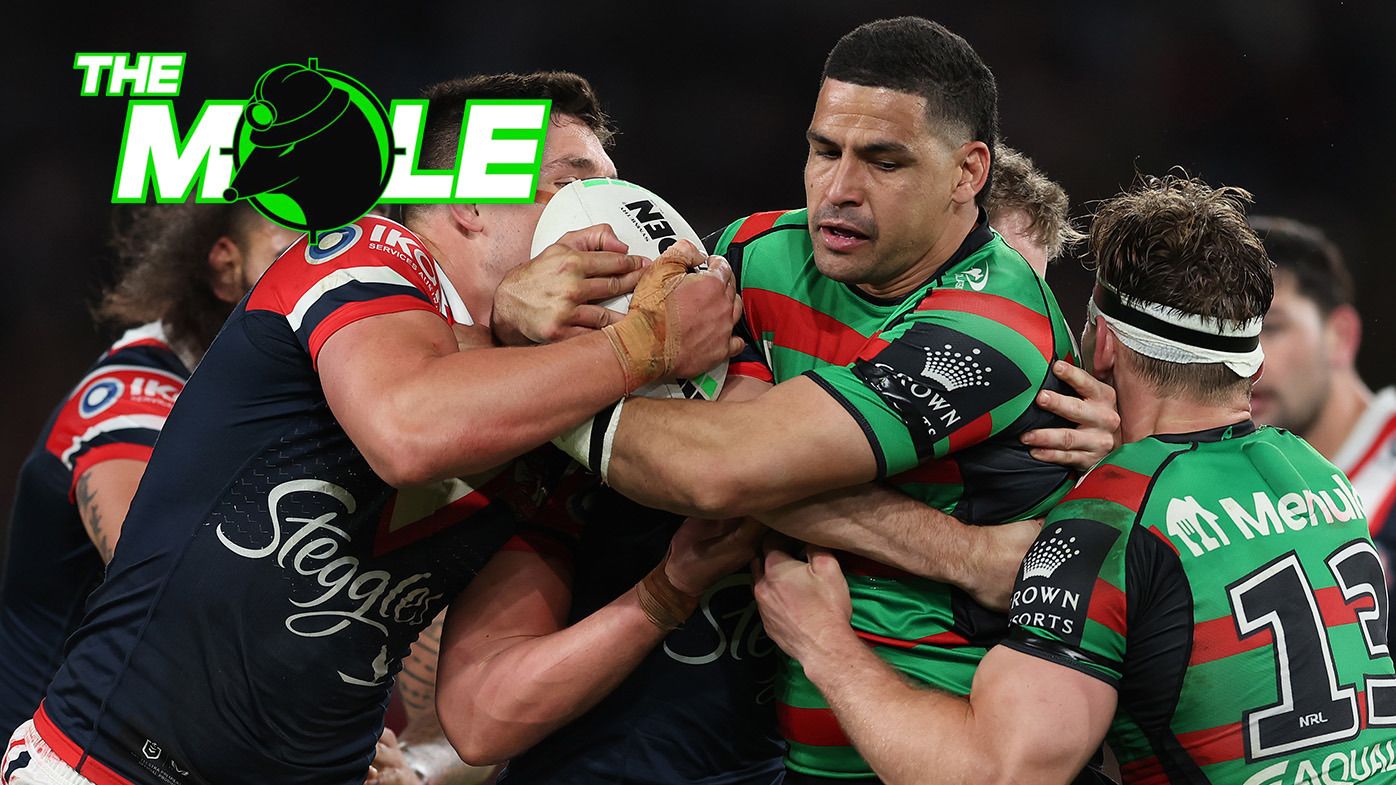 Rabbitohs playmaker Cody Walker is tackled by the Roosters.