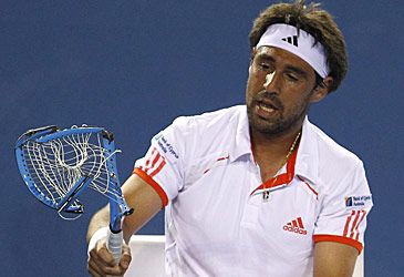 How many racquets did Marcos Baghdatis break in one changeover at the 2012 Australian Open?