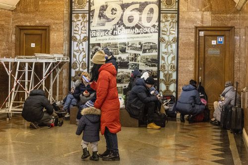 People shelter in a subway in Kyiv 