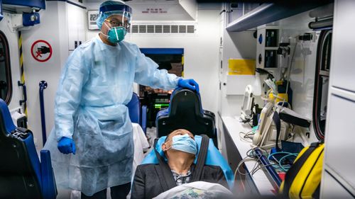 A patient is transferred by an ambulance to the Infectious Disease Centre of Princess Margaret Hospital in Hong Kong, China