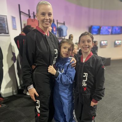 Erin Blight, breast cancer survivor, preparing to take flight with her kids at iFly Perth.