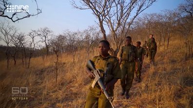 The Akashinga Rangers set off on a night patrol, searching for poachers and protecting local elephant herds. 