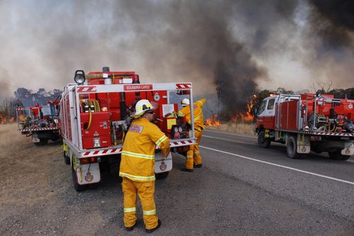 Crews are working to mop up spot fires in the area. (AAP)