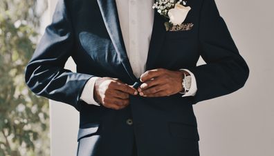 Groom getting ready before wedding.