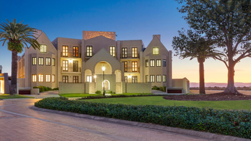 An impressive seven bedroom 'castle like' mansion is on the market on Knightsbridge Parade in Sovereign Islands on the Gold Coast.