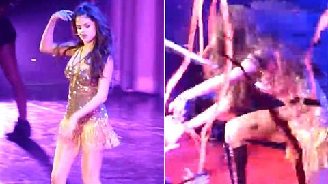 Boom! Watch Selena Gomez fall off stage