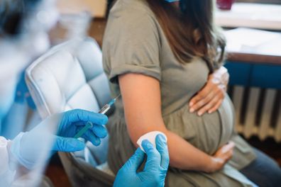 Pregnant woman getting COVID-19 vaccine