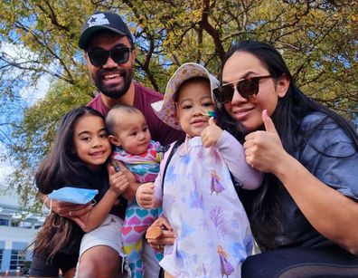 Fiapule during treatment with her family, including her elder sister and baby sister.