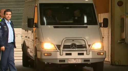 Pell was led away from court in this prison van.