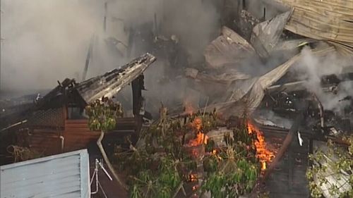 The roof of the home collapsed as the blaze took hold. (Choppercam)