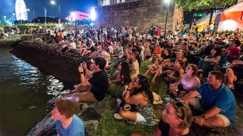 New Year's Eve revellers at Brisbane's South Bank in pre-COVID times.