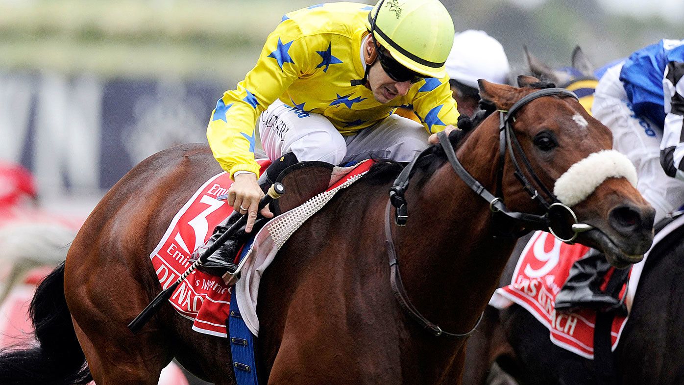 French horse Dunaden ridden by Christophe Lemaire gallops to victory in the 2011 Melbourne Cup 