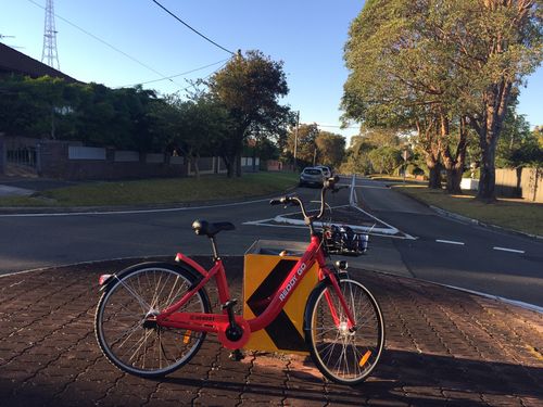 A hire bike dumped at a round-a-bout in Artarmon on Sydney's north shore.