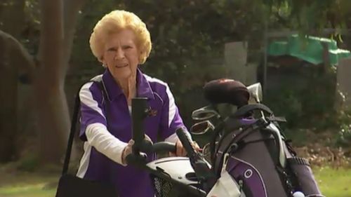 Instead of using a golf cart, Ms Willcox chooses to walk her way around the course. (9NEWS)