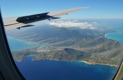 View from the plane towards iconic hawaiian volcano crater