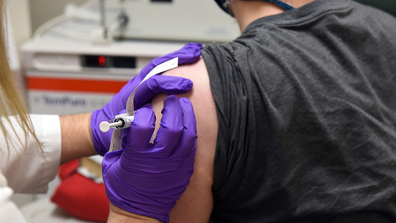 The first patient enrolled in Pfizer's COVID-19 coronavirus vaccine clinical trial gets the jab at the University of Maryland School of Medicine in Baltimore on May 4, 2020.   (University of Maryland School of Medicine via AP, File)