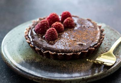 Recipe: <a href="http://kitchen.nine.com.au/2016/05/20/10/04/sneh-roys-raw-chocolate-tart" target="_top">Sneh Roy's raw chocolate tart</a>