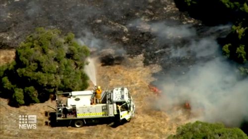 More than 200 firefighters were on the ground working to contain the Martin bushfire that was burning out-of-control. 