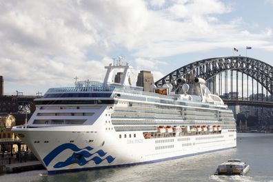 The Coral Princess docks at Circular Quay on July 13, 2022 in Sydney, Australia. The Coral Princess, currently experiencing a COVID-19 outbreak on board, arrived in Sydney on Wednesday morning. (Photo by Jenny Evans/Getty Images)