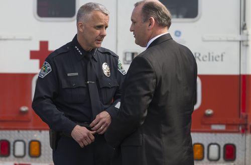 Austin Interim Chief of Police Brian Manley, left, speaks with FBI Special Agent in Charge of San Antonio Division Christopher Combs (AAP)