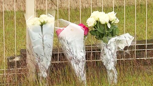 Floral tributes have continued to grow overnight following the death of a Maryborough mother after she was attacked by three dogs. 