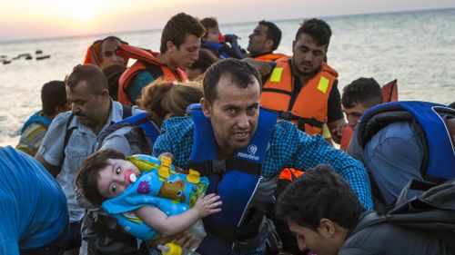 Syrian migrants crossing the Mediterranean Sea from Turkey to the Greek island of Kos. (AAP)