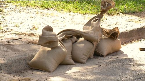 The sandbags are being handed out to homeowners and businesses ahead of tomorrow's expected deluge. (9NEWS)