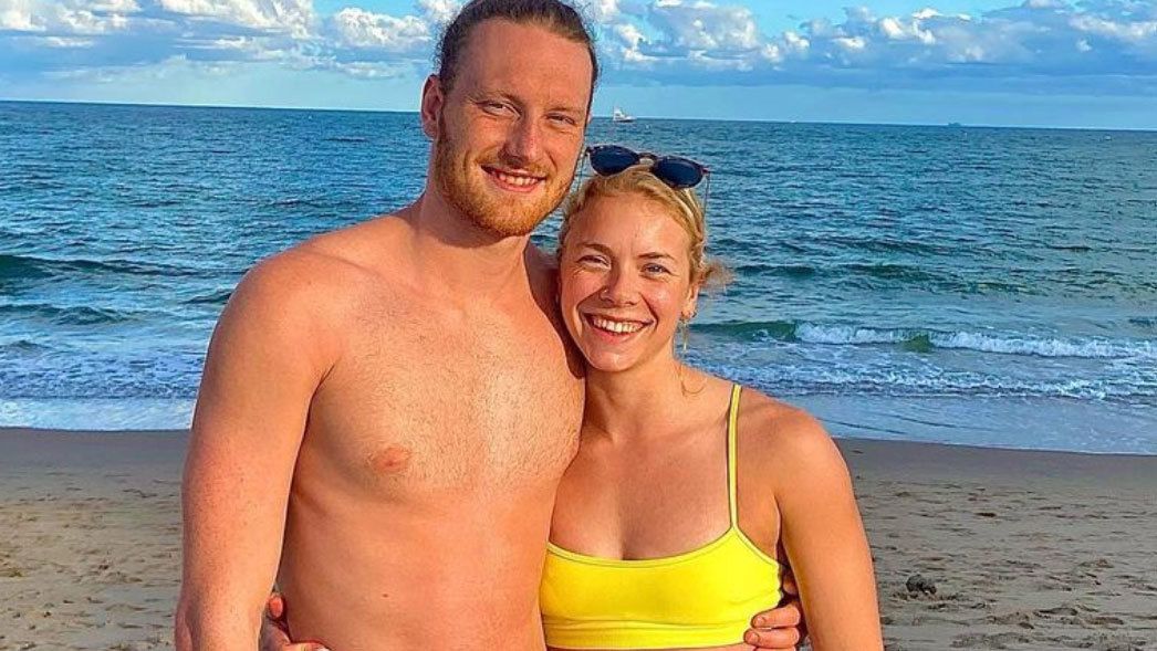 Luke Greenbank poses with girlfriend Anna Hopkin, both swimmers in the Great Britain team.