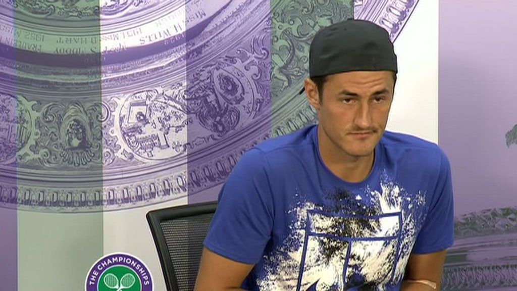 'Bored' Tomic bows out of Wimbledon opener