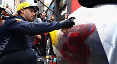 'Throwing paint around on the streets of Melbourne': Daniel Ricciardo sprays paint in Melbourne's famous laneways. (Twitter)
