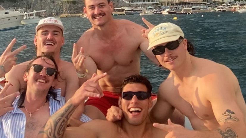 Liam Hampson (far right) was found dead at a nightclub in Spain. This photo was taken in the weeks leading up to his death, as part of a trip of a lifetime with footy mates, including AJ Brimson (top left). 