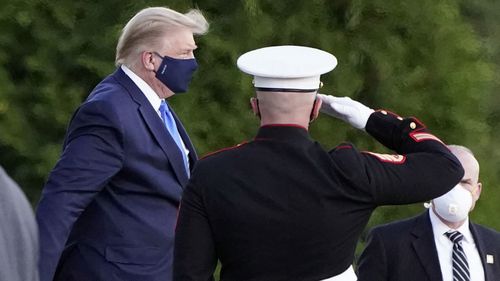 President Donald Trump arrives at Walter Reed National Military Medical Center, in Bethesda, Maryland on October 2.