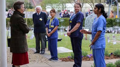 Princess Anne speaks to NHS workers and frontline staff from Wotton Lawn Hospital to thank them for their work during the pandemic