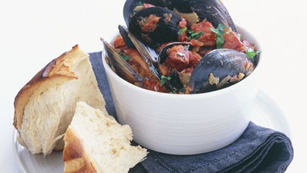 Steamed black mussels with tomato sofrito and chorizo